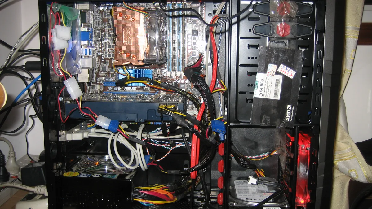 Inside an older desktop gaming PC with a GeForce GTX 460, DDR3 RAM and a hard drive, the kind of machine a budget upgrade can bring back